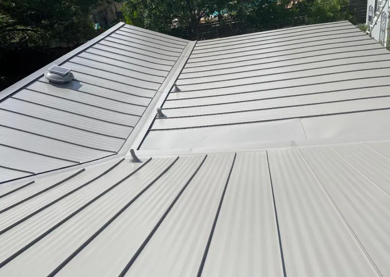 Solar attic fan installed on a metal roof for Roof Ventilation in East Honolulu